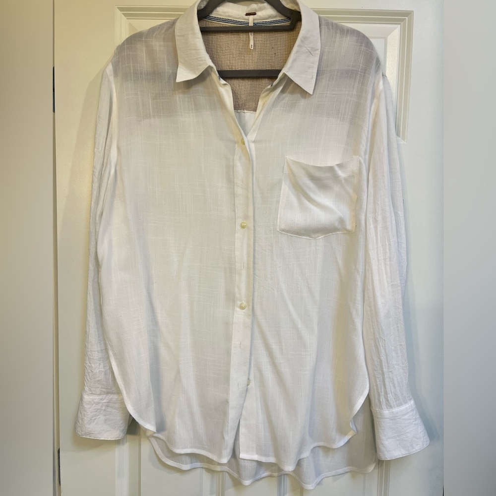 Free People button down top. Size Medium